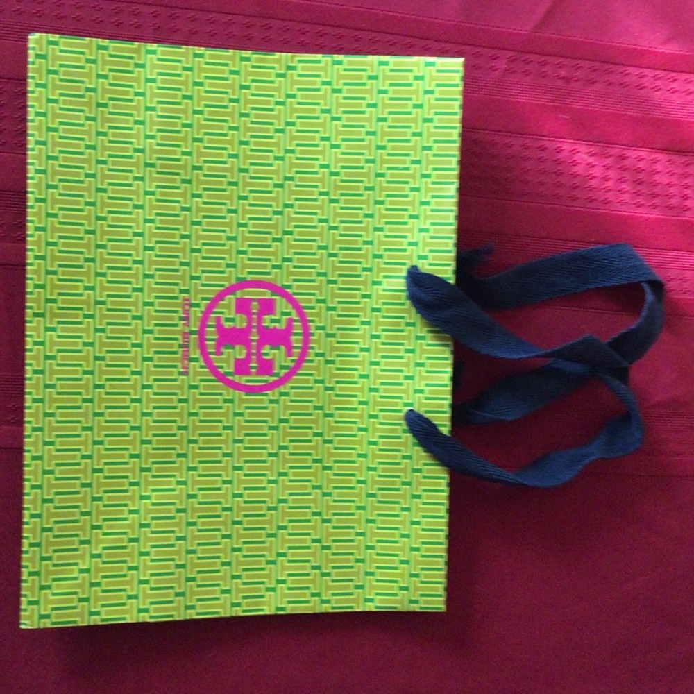 Paper authentic tory burch bag.